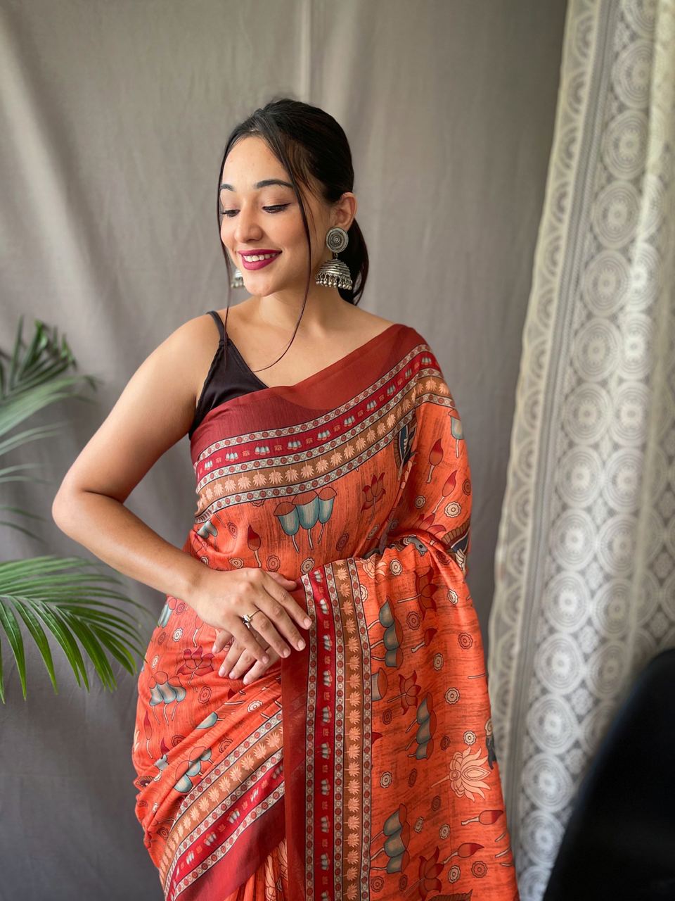 Women's Artistic Terracotta Orange Linen Saree with Kalamkari Inspired Print & Tassel Detailing â Perfect for Casual Festivities & Cultural Events